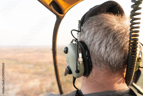 Helicopter pilot exploring Botswana's vast landscapes