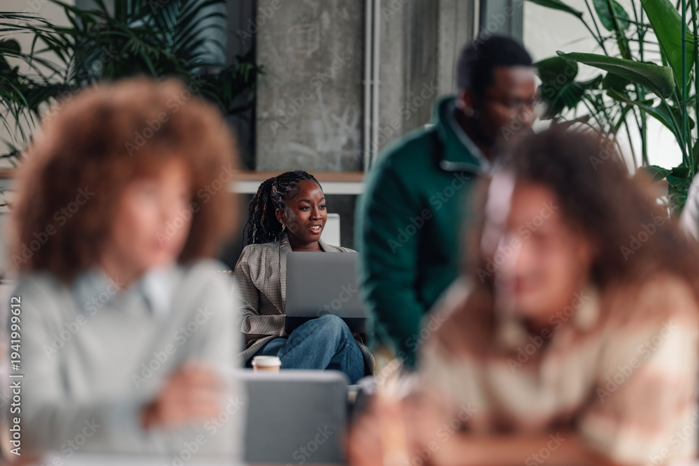 Fototapeta premium Diverse business team collaborating in modern office space