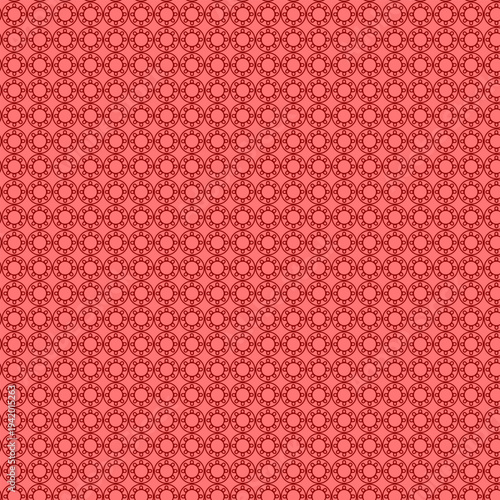 A close-up view of a textured reddish-brown woven fabric surface