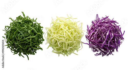 Three piles of shredded colorful cabbage on transparent background