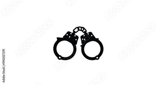 Black handcuffs displayed against a white background stark silhouette