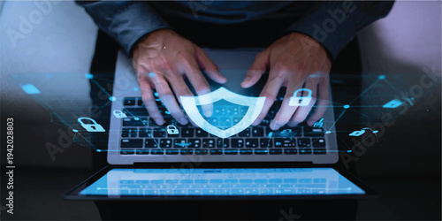 Close-up of hands typing on laptop with glowing digital shield and lock icons, representing online security and privacy, lock icon, data protection, technology background