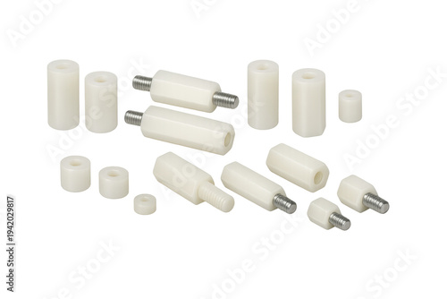 Фотография Nylon standoff spacers and insulating hardware assortment on transparent backgro