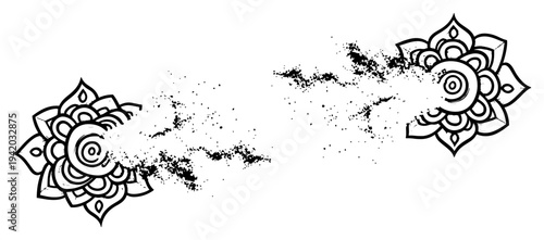 Floral mandala ornaments fading and disintegrating into scattered dust particles