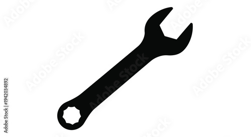 A black wrench tool is prominently displayed as a dark silhouette