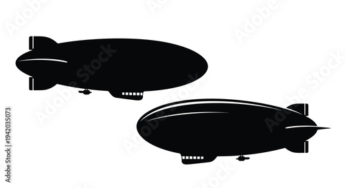 Two airships floating in the sky a stark black silhouette