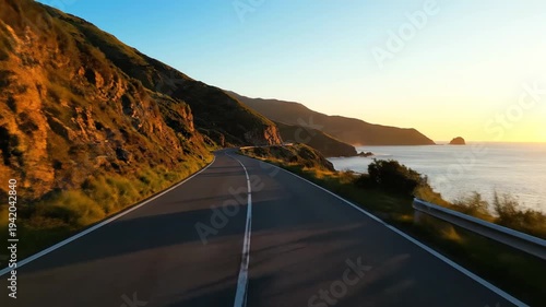 Coastal Road Adventure - A Scenic Drive Along the Ocean at Sunset.