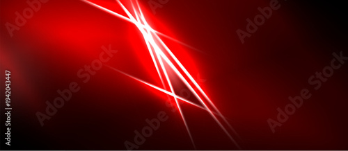 Abstract red background. Bright lines intersect, creating dynamic visual effect. Dark areas contrast with vibrant illumination.