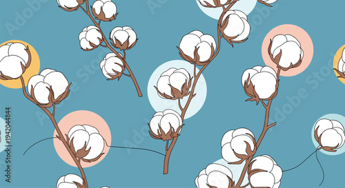 Seamless pattern featuring branches of white cotton bolls with brown husks on a blue background with pastel circles.