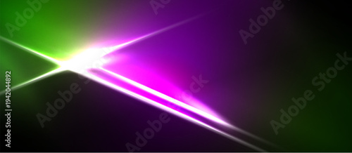 Abstract vibrant light streaks. Green, purple hues dominate dark background. Bright focal point creates dynamic visual effect.