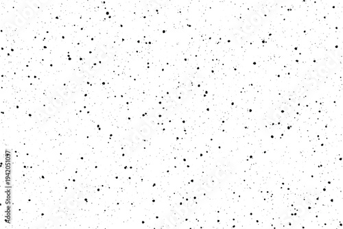 A vast array of tiny black dots appears scattered across a clean light colored canvas