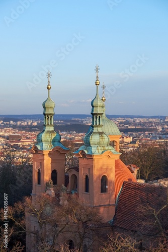 Cuadro en lienzo St Nicholas Church towers with copper domes overlooking Prague skyline in soft e
