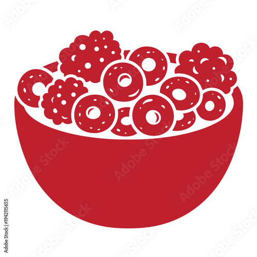 Red bowl filled with red cereal rings and berries on white background