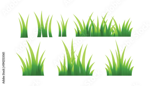 Set of green grass tufts and field elements isolated on white background for landscape and nature design