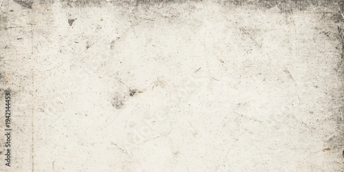 A blank vintage design features a rough old paper texture blended with a grimy white stone wall pattern to create a weathered grunge surface for use as a textured marble or cement background