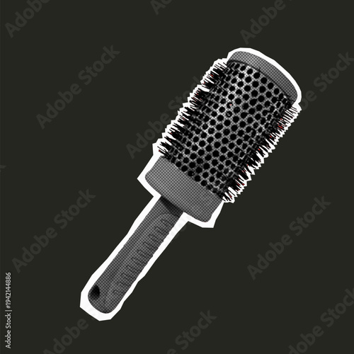 Round hairbrush for blow drying and styling isolated on dark background in monochrome style.