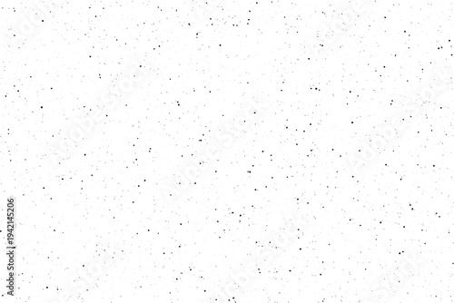 Clean white field adorned with a gentle sprinkle of tiny black dots creating a unique speckled effect