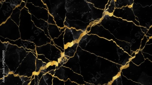 Black marble surface with intricate golden veins, elegant abstract texture.