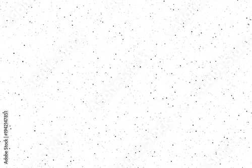 Simple white backdrop covered with small irregular black specks resembling dust or digital noise