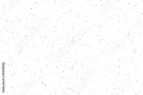 Small dark particles are evenly distributed across a bright white plane forming a delicate speckled finish