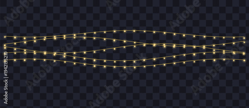 Bright golden yellow bulbs on elegant string lights softly illuminate a dark