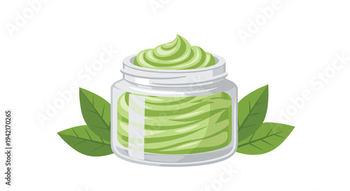 A clear glass jar containing a vibrant green, swirled cream is prominently displayed with two dark green leaves on a pristine white background.