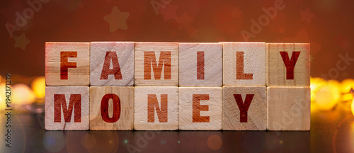 Fotografía Wooden blocks spelling family money for inheritance and generational wealth plan