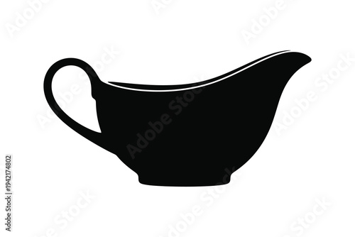 Black silhouette of a gravy boat with handle on white background, isolated kitchen utensil for pouring sauces.