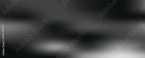 Abstract grainy black and white gradient background with soft wavy silk texture and noise effect.
