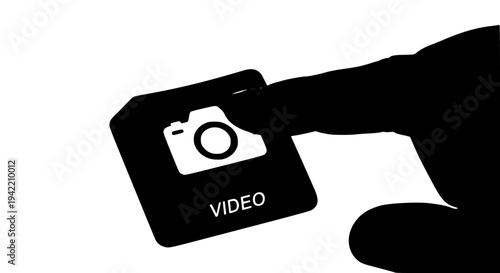 Finger pressing black keyboard button featuring white camera icon above word video for recording media creation concept on transparent background