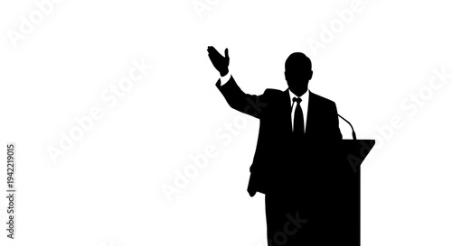 Silhouette of a businessman giving a speech at a podium