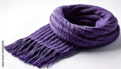Cozy purple knitted scarf with fringe on white background.