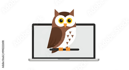 Owl sitting on laptop computer screen