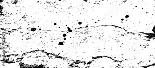 Grunge distressed black and white texture with cracks and ink splatters abstract background