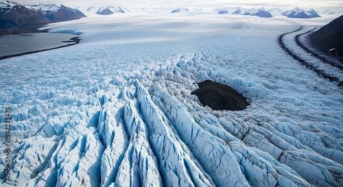 Stunning Aerial View of a Massive Glacier Landscape with Mountains and Ice Formations.