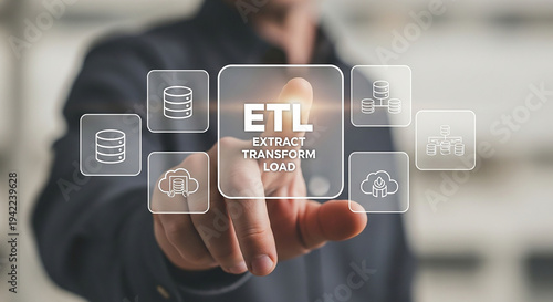 ETL Technology : A person using finger touch on ETL (extract, transform, load) words with digital database, cloud computing, data mining concept.