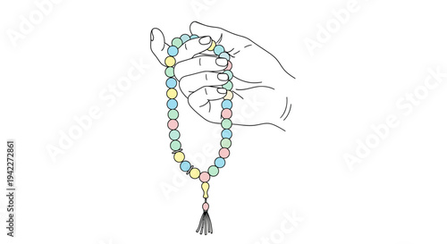 Hand holding colorful prayer beads.