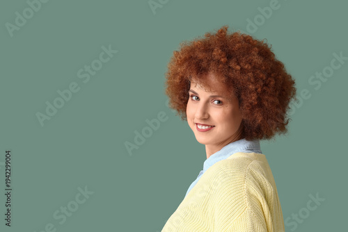 Redhead young woman with cu...