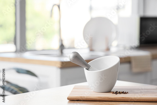 Mortar with pestle and pepp...