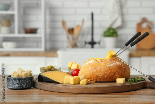 Cheese fondue in bread with...