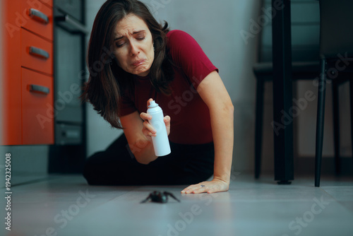 фотографія Disgusted Woman Getting Ready to Spray Giant Bug