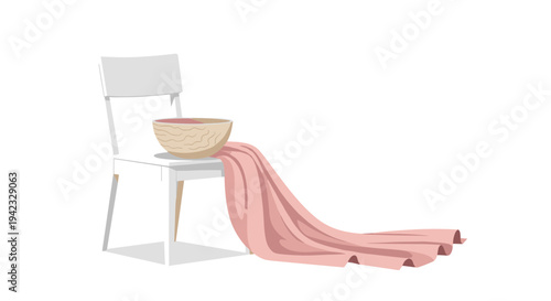 A simple white wooden chair holds a woven bowl with a long pink fabric elegantly draped over it.