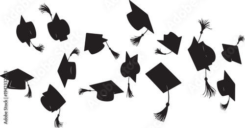 Graduation caps and tassels flying in the air celebrating