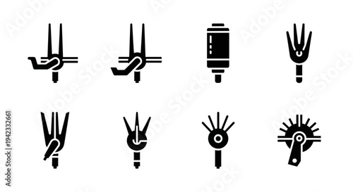 Collection of Isolated Black Symbols Representing Various Tools and Equipment