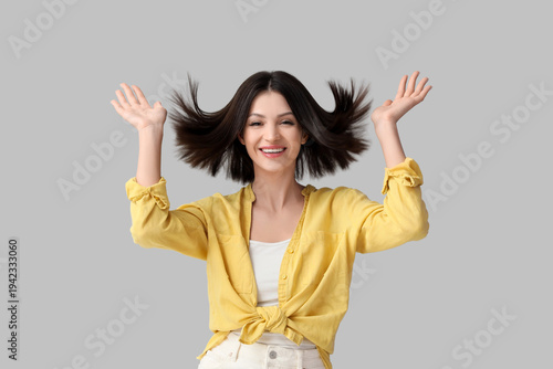 Beautiful young woman with ...