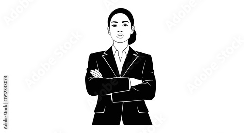 A confident woman in a business suit stands with her arms crossed.