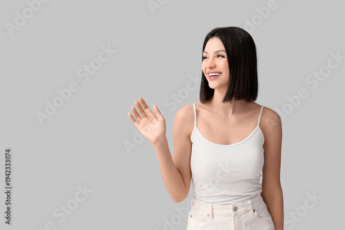 Beautiful young woman with ...