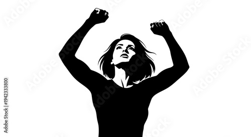 A woman celebrating with her arms raised in triumph and joy.
