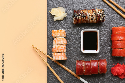 Tasty sushi rolls with mari...