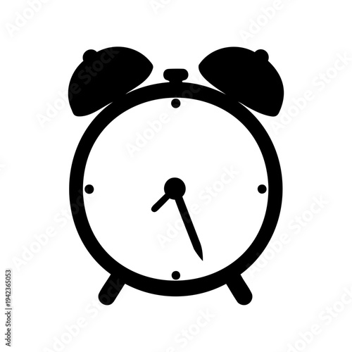 Silhouette of an old fashioned alarm clock showing almost 530 time